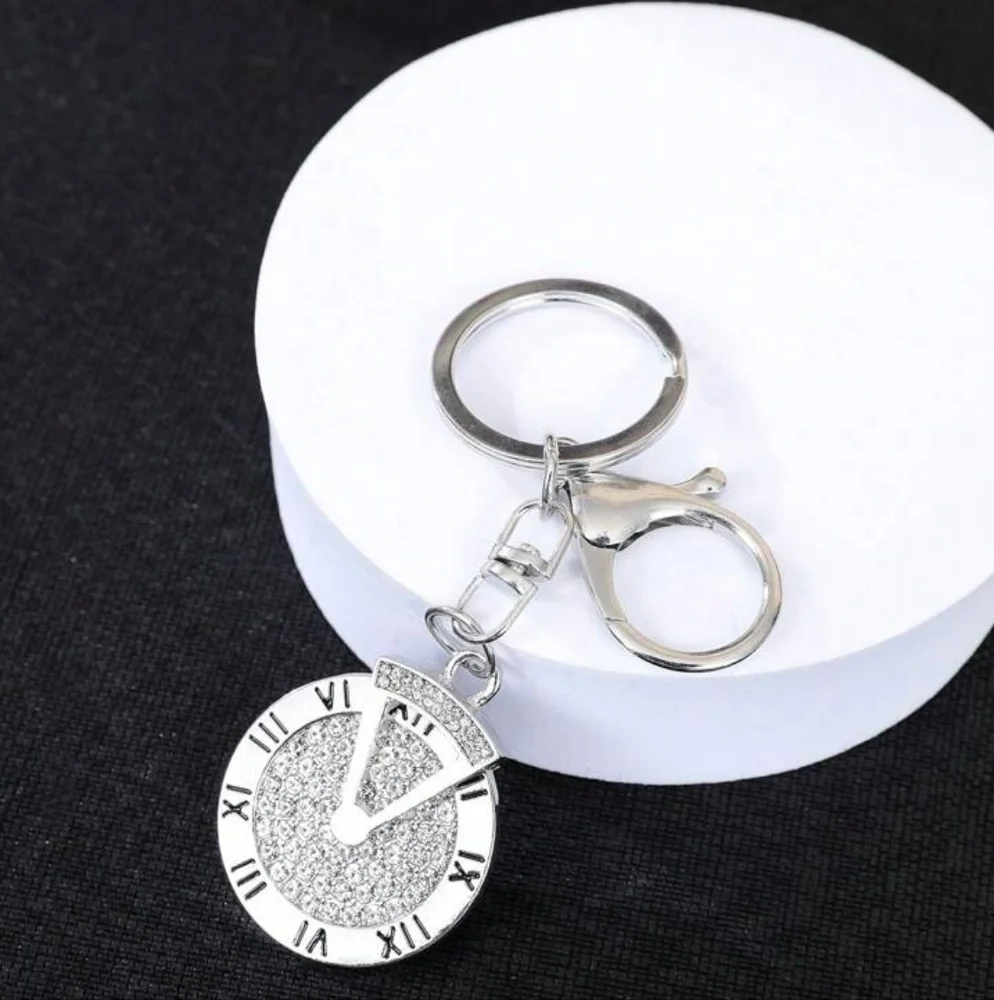 Rotating Roman Keychain